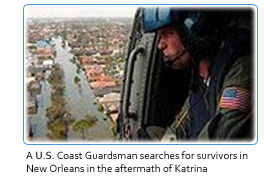 Image of A U.S. Coast Guardsman searches for survivors in New Orleans in the aftermath of Katrina